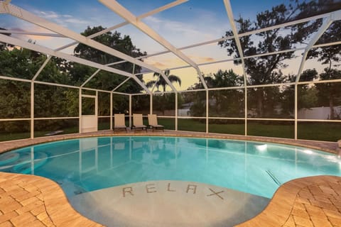Whether it’s a refreshing swim or a cozy soak, this pool and spa area delivers.