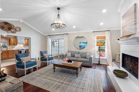 Comfortable seating and a warm color palette make this living room the perfect spot for relaxing with family or friends.