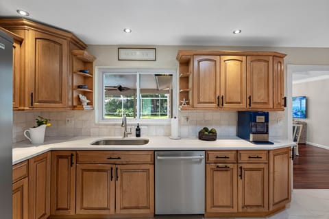 With ample storage and counter space, this kitchen is ideal for preparing meals or hosting gatherings.