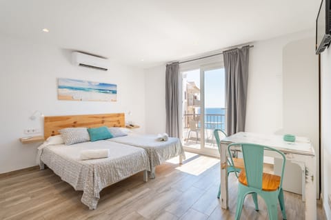 Superior Studio, 2 Twin Beds, Kitchenette, Partial Sea View | Individually furnished, free WiFi, bed sheets