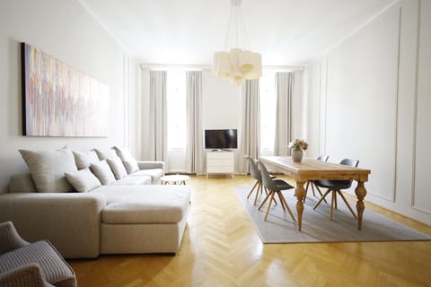 Deluxe Apartment | Living area | 40-inch LCD TV with cable channels