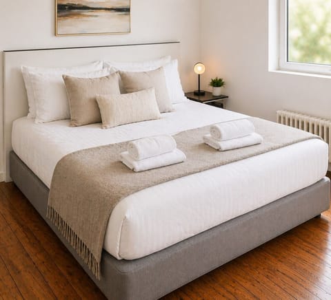 Relax in a bright and comfortable bedroom.