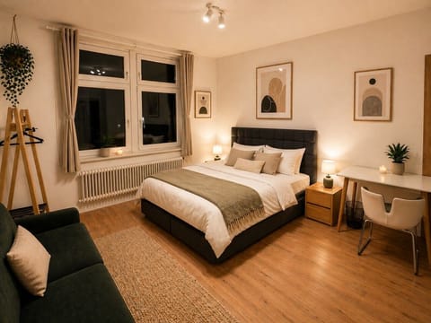 Relax in a stylish bedroom designed for comfort and productivity.