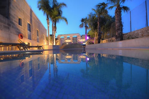 Outdoor pool, open 9:00 AM to 6:30 PM, pool umbrellas, sun loungers
