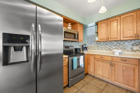 Kitchen Stocked with cooking/eating utensils