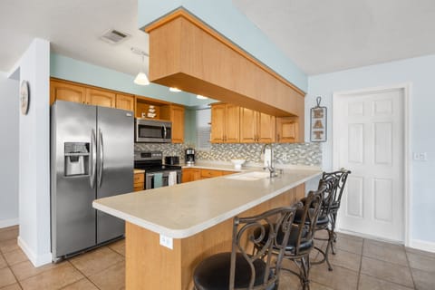 Kitchen Stocked with cooking/eating utensils