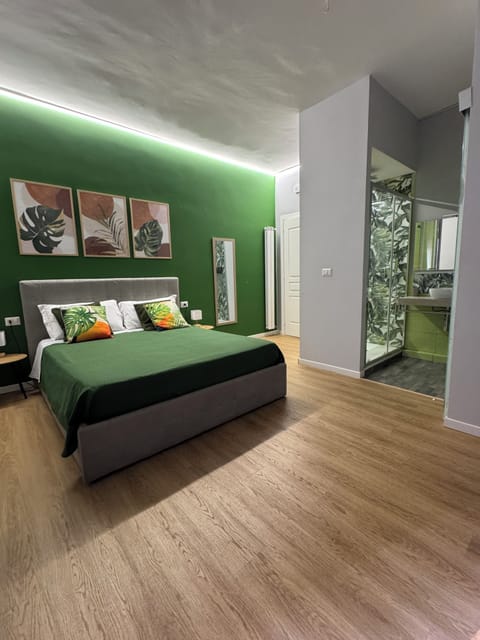 Deluxe Room, Balcony | Down comforters, individually decorated, individually furnished, desk