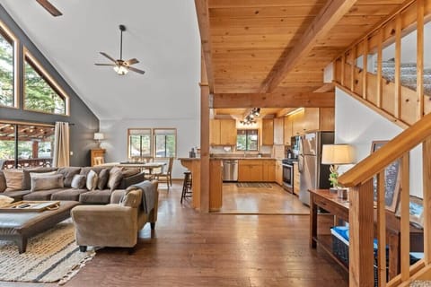 The bright and inviting main level boasts a living room/dining/kitchen that seamlessly blends together in an open layout.