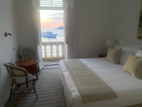 Romantic Double Room, Balcony, Sea View | 1 bedroom, in-room safe, desk, iron/ironing board