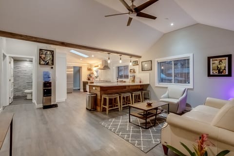 Open concept main level with two bedrooms and bathrooms