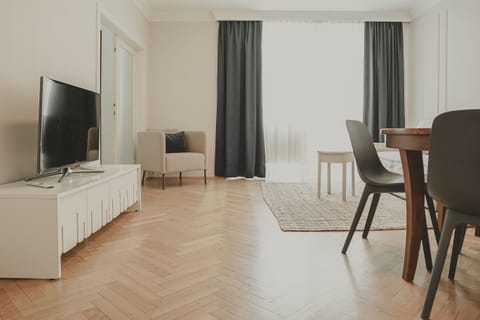 City Apartment | Living area | 40-inch LCD TV with cable channels