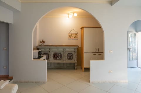 Family Suite | Living area | 30-inch flat-screen TV with cable channels