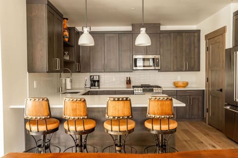 Open Kitchen with Bar Seating for 4