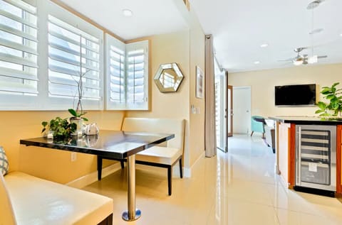 Kitchen Dining Area Along with Breakfast Bar.