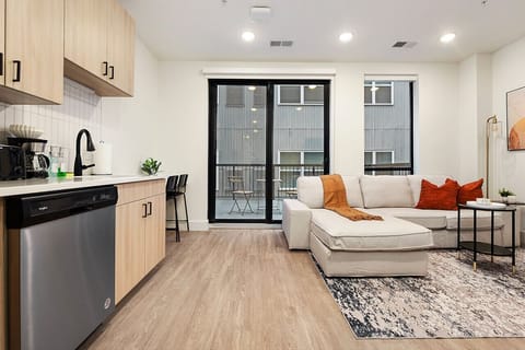 Open Concept Living Room. No Patio in This Unit, Large Windows Instead