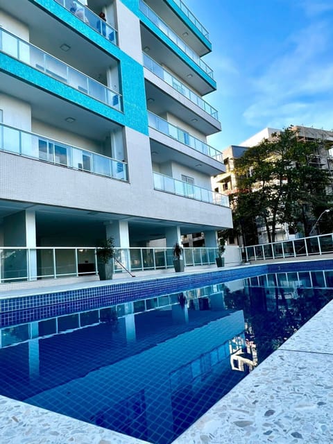 Apartment | Pool | Outdoor pool, a heated pool, open 10:00 AM to 10:00 PM, pool umbrellas