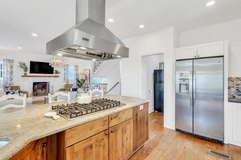 Open kitchen features plenty of space to prepare and serve