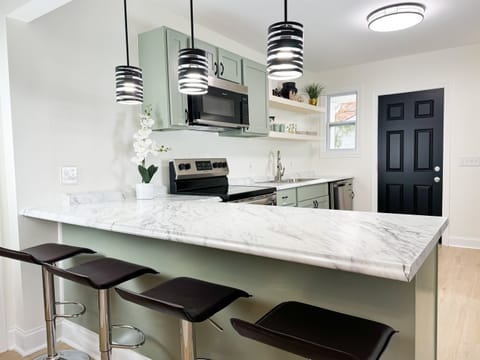 Open concept kitchen with bar style seating