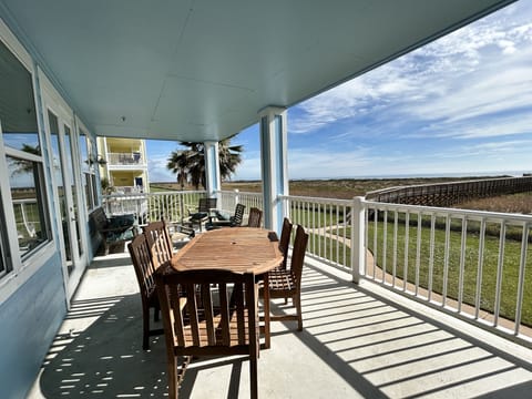 Outdoor large patio has plenty of seating and a great view of the Gulf of Mexico