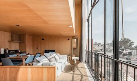 Experience urban tranquility from your private balcony with city views.