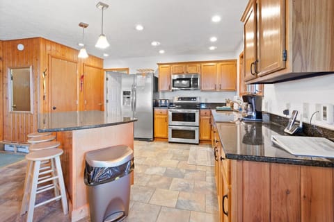 Large kitchen with stainless steel appliances