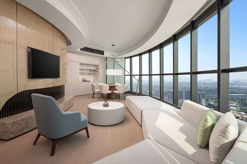 Suite, 1 King Bed, Non Smoking, Lake View | Minibar, in-room safe, blackout drapes, iron/ironing board