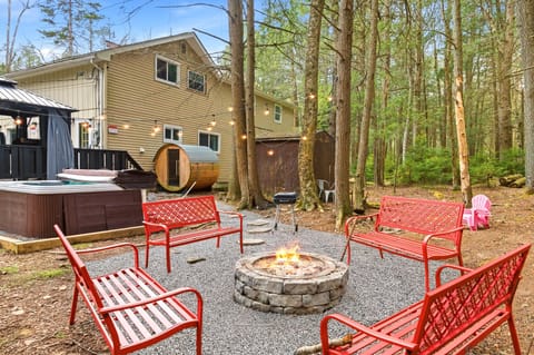 “Gather around the fire pit — where good conversations, warm nights, and forest calm come together.”