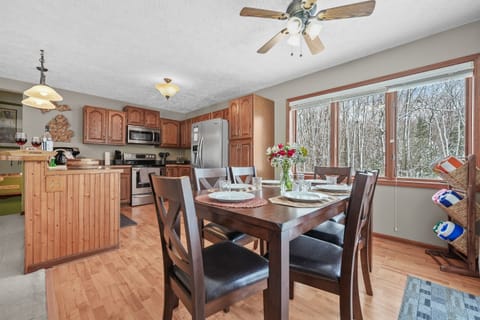 Dining Area: Savor delicious meals surrounded by nature's beauty and charming decor!