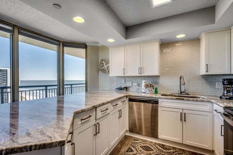 Well equipped kitchen with a view.