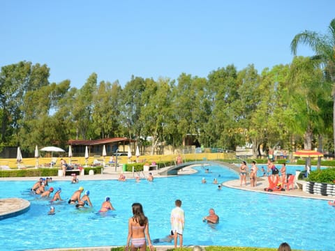 Water, Plant, Sky, Swimming Pool, Azure, Outdoor Recreation, Tree, Leisure, Resort Town, Recreation