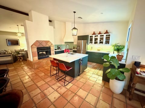 Kitchen, Wine Fridge built in Island & Leather Stools.