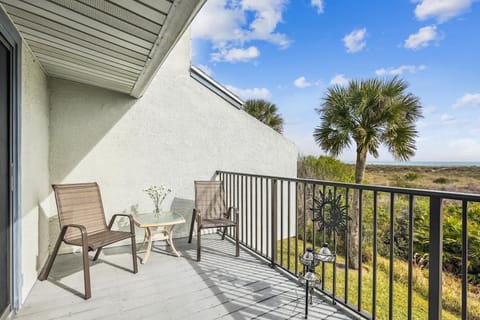- Balcony with chairs perfect for morning coffee or evening chats  
- Enjoy open views of ocean skies and refreshing salty breezes  
- A calming space to relax unwind and recharge during your stay  

