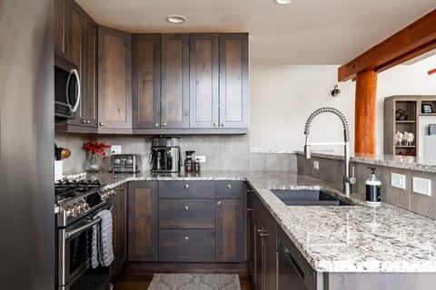 Condo, 3 Bedrooms | Private kitchen | Fridge, microwave, coffee/tea maker