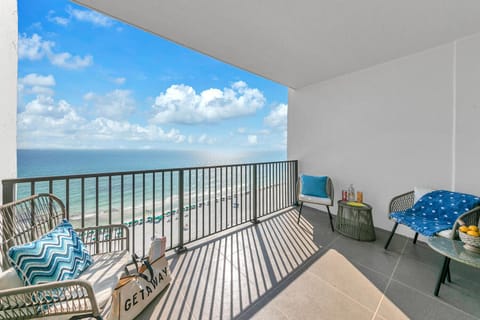 Your private balcony offers stunning gulf views where you can sip morning coffee while watching waves meet pristine white sand below.