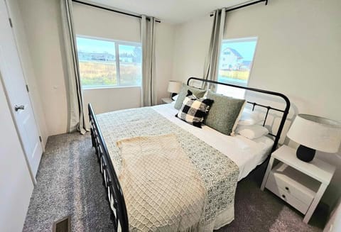 King bedroom with room-darkening shades for ultimate comfort