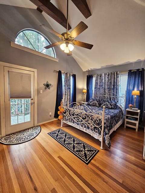 master bedroom with outside balcony 
