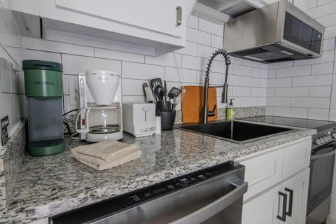 The kitchen has both a drip style and a Keurig coffee maker!