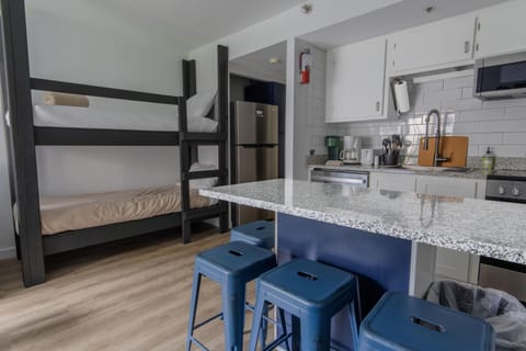 The twin-over-twin bunk bed offers additional sleeping capacity.