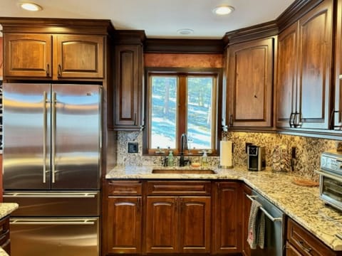 Enjoy the mountain views while using the copper sink