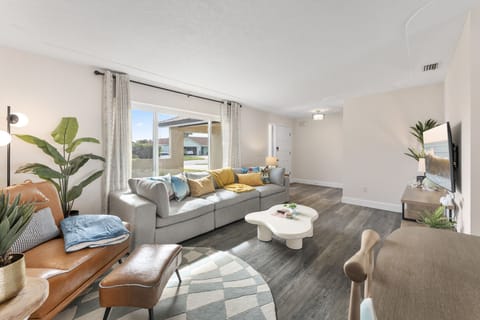 Enjoy an open dining and living area with a modern Scandinavian vibe