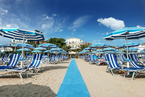 Private beach, white sand, sun loungers, beach umbrellas