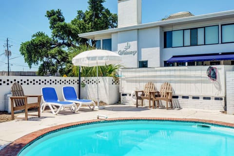 Lounge or play by this beautiful community pool