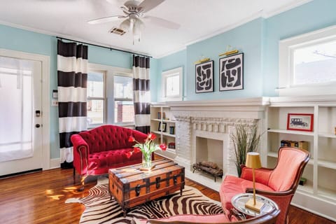 Living room with a nice aesthetic couch and an antique design table.