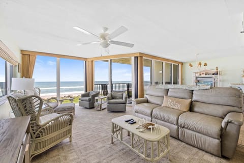 Spacious living room with beautiful ocean views.