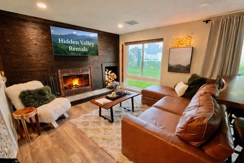 Snuggle in for a movie night or grab a drink and warm your toes by the fire