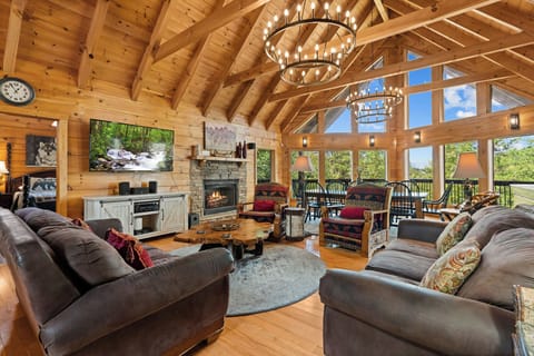 Living room with stone fireplace