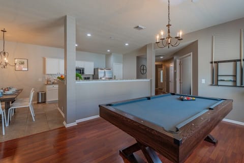 Pool table off kitchen & dining area