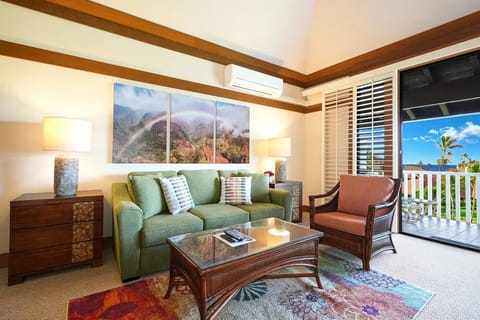 Living area with Queen memory foam sofa sleeper.