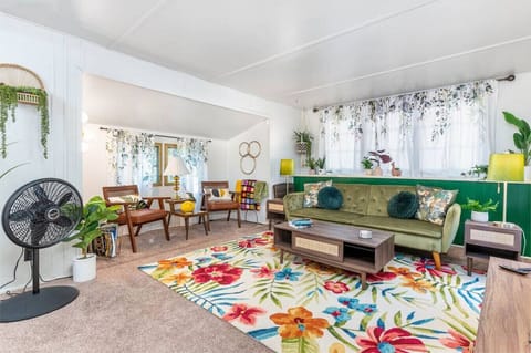 Living Room with Retro Inspired Decor, Air Conditioning! Portable fan!