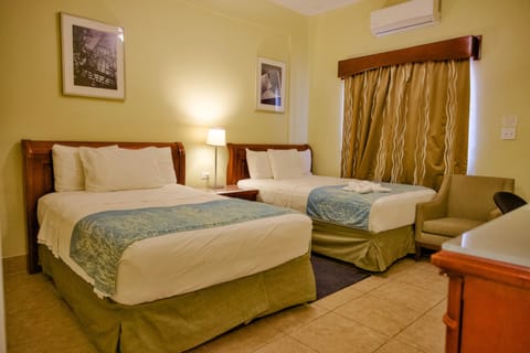 2 double Beds Deluxe Poolside | Premium bedding, pillowtop beds, in-room safe, individually decorated